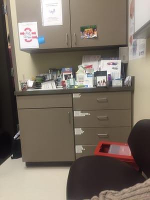 Cluttered "sink" that had the doctors Starbucks breakfast still sitting there.