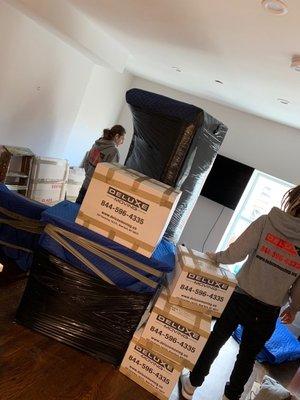 Deluxe Moving's boxes are made with post consumer recycled materials.