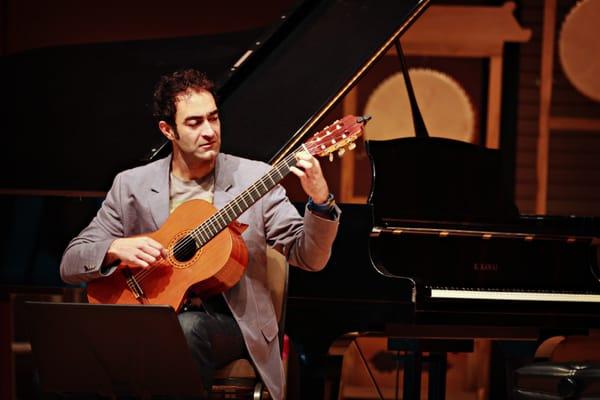 Payam playing Spanish Classical Guitar as a guest for The Piano Studio of Dr. Jung Sook Lee-French in Laguna Beach, CA.