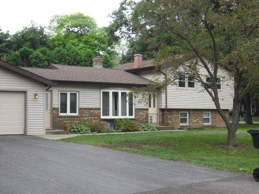 Bow window, Casements, Double Hungs, and Siding in Glenview, IL.