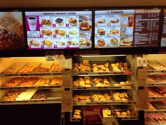 Menu and freshly baked doughnuts and pastries