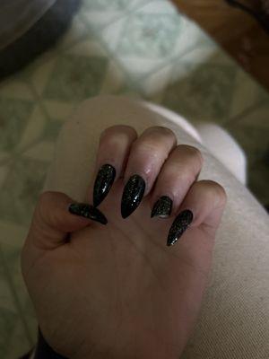 This is my acrylic set that I just had last week and one of them already broke. I never get long nails ever I am always getting short nails.