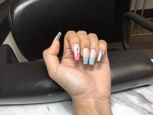 Ombré with nail jewels and chrome.