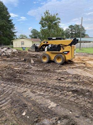 Skidsteer in action!  Cleanup time!