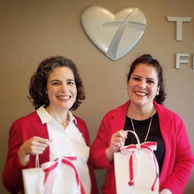 Financial Consultant Brittany & Office Manager Beth deliver Valentines goodie bags to our widowed clients.