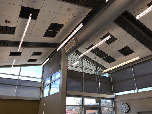 Bottom up & top down motorized roller shades installed by Drapery Concepts