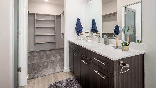 Bathroom attached next to a walk-in closet