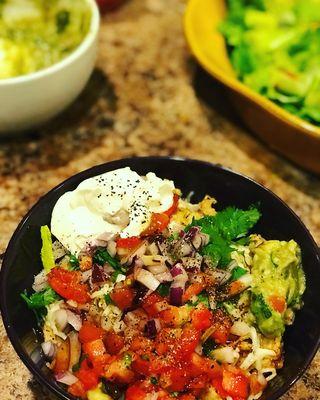 Burrito bowls made with all organic ingredients and handmade guacamole!