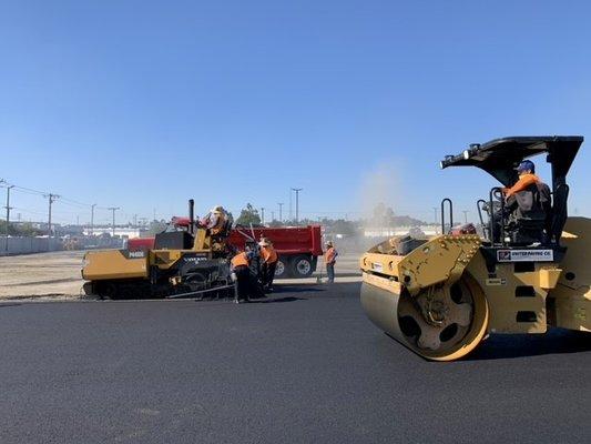 One of our small pavers and rollers for an asphalt R & R project.