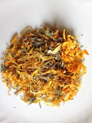 This herbal tea is bright with calendula and other herbs. Alternative medicine, herbalist, holistic health