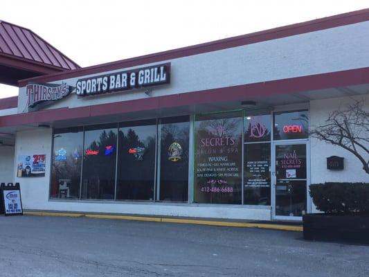 The salon is located in the last unit in the shopping plaza where Kuhn's and the Sport Bar and Grill in Allison Park!