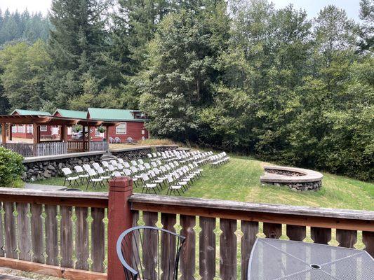 hilltop area for wedding set up and cabins in the distance