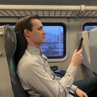 He taught me how to see on the train and use my phone without staring my neck.