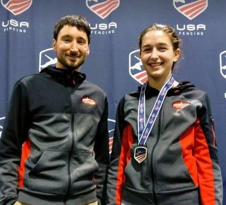 Coach Jim Roberts with student Julia Balch posing after winning the Anaheim North American Cup.