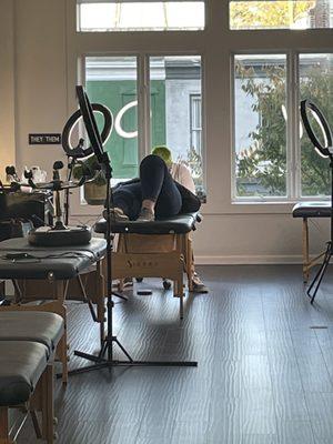 Miche doing my friend's brows in the beautiful studio