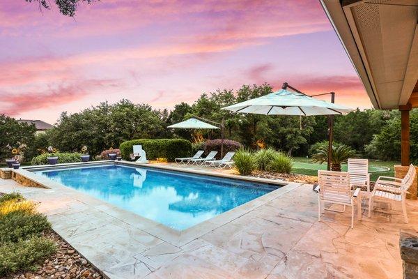 Relax by the sparkling swimming pool at our Expansive Estate with luxury backyard amenities!