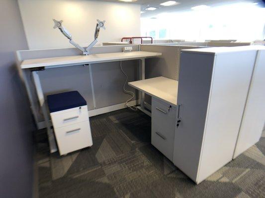 Panel system work stations w/ sit to stand desks.