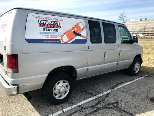 One shot cleaning service custom vehicle graphic.