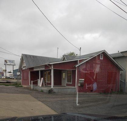 Front of building. Park in back if need to.