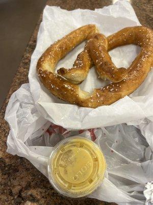 Delicious regular pretzel with honey mustard dip