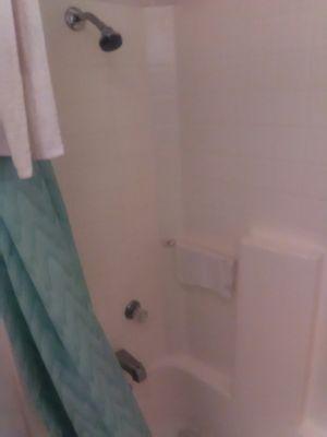 Tiny, ghetto shower. The shower head hits me in the neck and im not that tall.