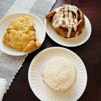 white chocolate scone, cinnamon roll, iced lemon muffin