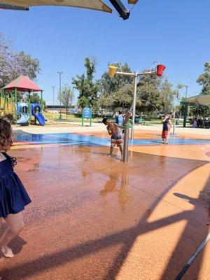 View of young playground and bucket dumps