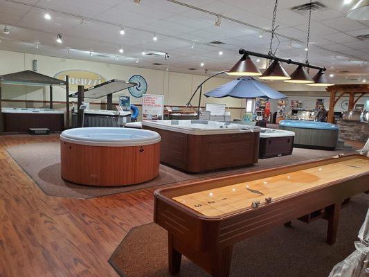 Phillips Lifestyles showroom showing hot tubs and shuffle board