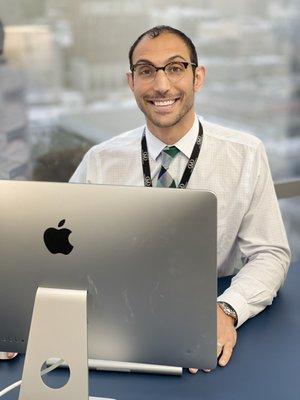 David Fouad Homsy ready by the computer to help all your diamond needs.