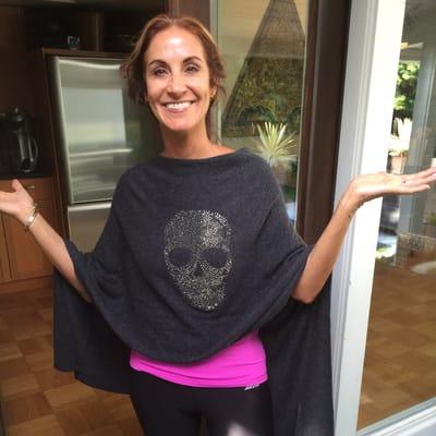 A happy customer in her new cashmere skull poncho