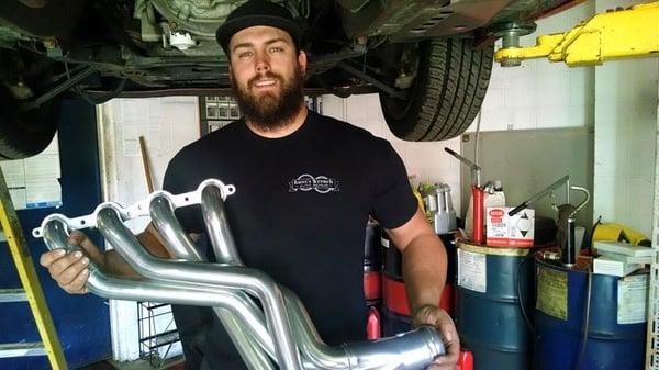 Customizing exhausts on performance vehicles with aftermarket accessories.