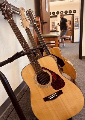 From the interior of guitar practice room toward "The Nest" featuring Dan