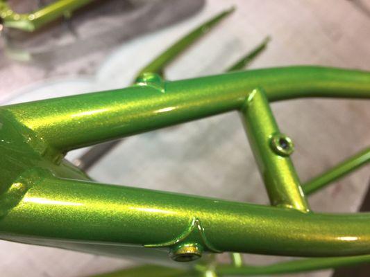 Close up of finished bike frame - powder coated "Crab Apple"