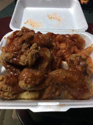 The wings with mumbo sauce and fries for $8, The food is good.