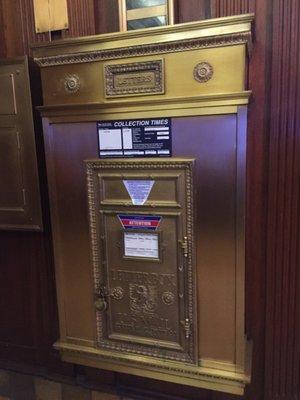 Even the brass postal box is pretty.