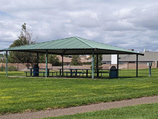 Shaded picnic tables