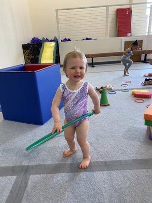 Hula hoop fun with the foam pit in the background.