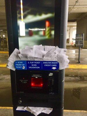 The battle at the exit! People adding old tickets to machine & management could just fix this with a garbage can. Let's end this battle!