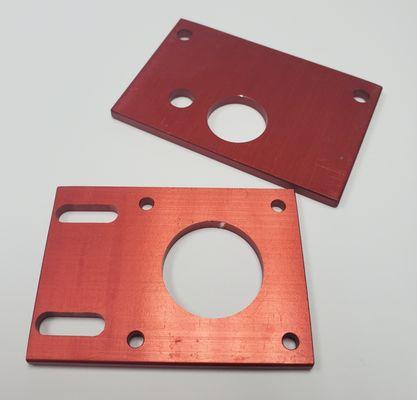 Aluminum - CNC Milled & anodized red.