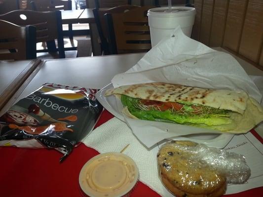 A personalized Californian/chicken salad Pita w/chips, chocolate chip cookies and an Arnold Palmer