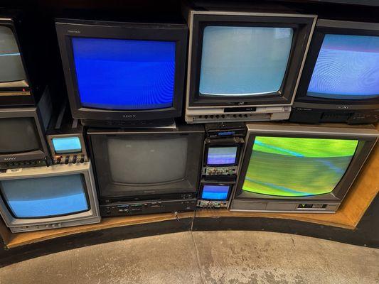 Group of old tvs