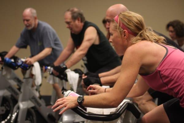 Members working hard in a spin class!