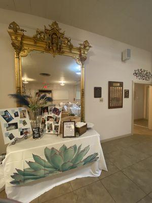 One of the Decorative mirrors , doorway on right leads to bathrooms.