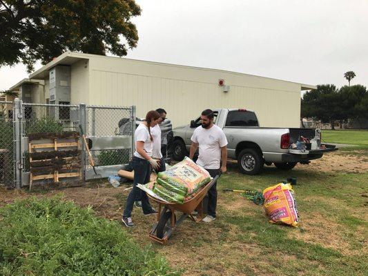 The Kinetic Financial team giving back to the community during a volunteering event.