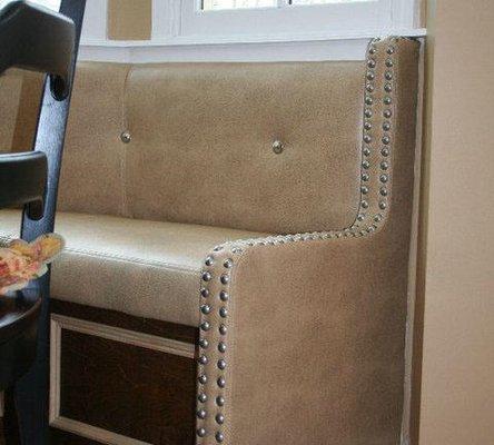 Custom built banquette with nail heads