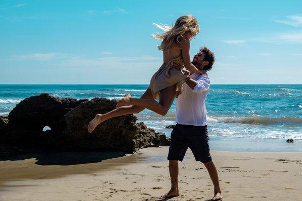 Newly Wed couple enjoying their honeymoon on the beach of Cabarete