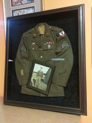 Framed uniform and photo by Big Picture Framing.