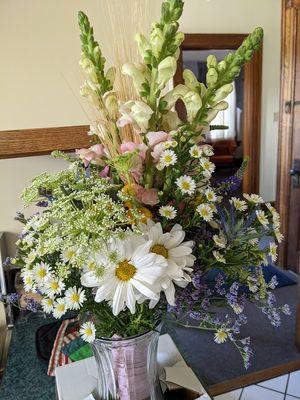 The bridal bouquet - I asked for the flowers to look as though they were picked from a field.