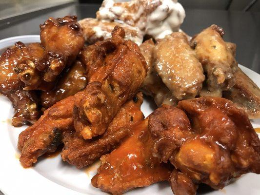 Wing Wednesday. $.50 all day. Choose from 11 different sauces. We can smother them or serve on the side.