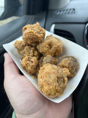 Deep fried mushrooms. Perfectly seasoned and served. Edit: I had already eaten half the order. It's a lot!!